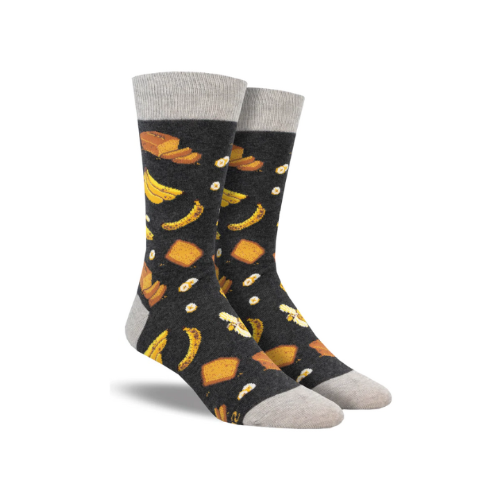 Socksmith Women's Banana Bread Socks featuring a black background with banana and bread patterns. 