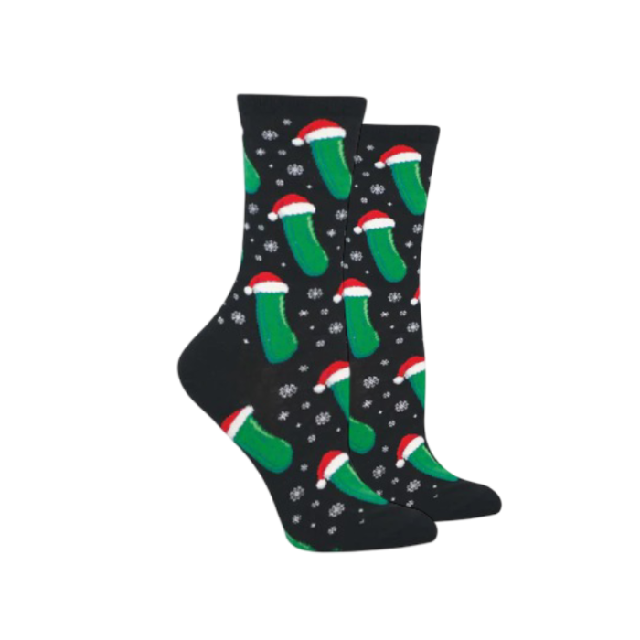 Black crew socks with snowflakes and pickles wearing Santa hat pattern.