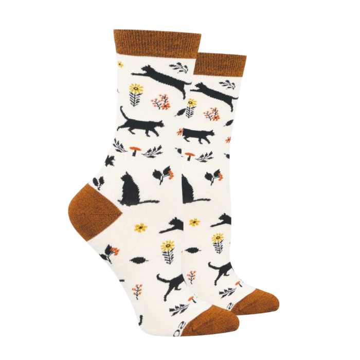 Ivory socks with black cats and flower pattern with brown cuff, heel and toe cap.