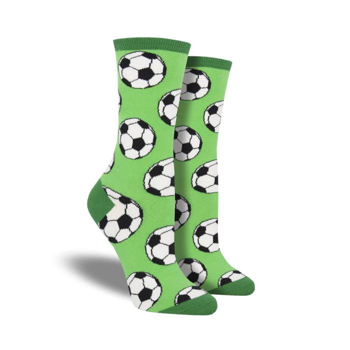 Light green socks with soccer balls pattern.