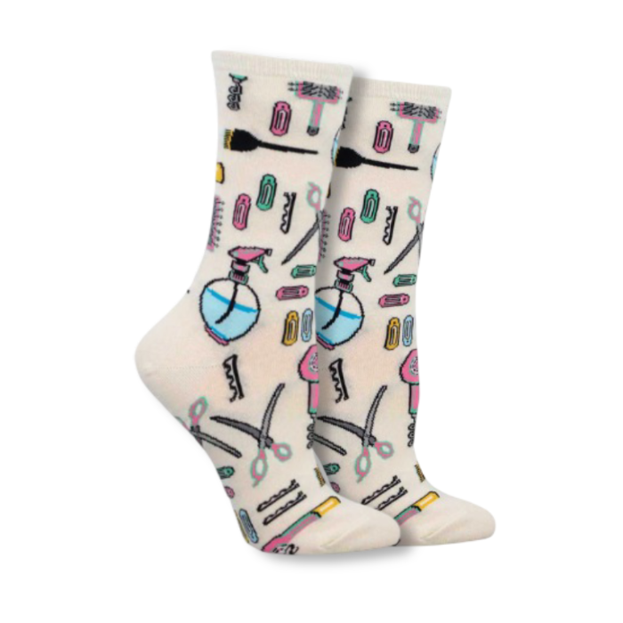 Ivory socks with Hair salon products on them such as scissors, pins, brushes and spray bottles.