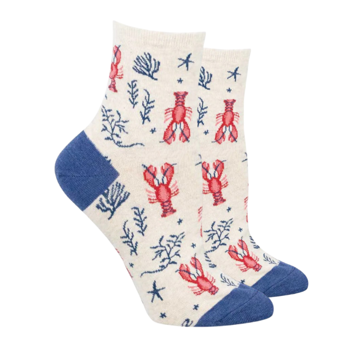 Ivory socks with red lobsters and coral pattern with blue heel and toe cap.