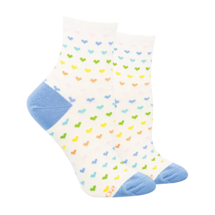 Ivory socks with colourful hearts covering them and blue heel and toe cap.