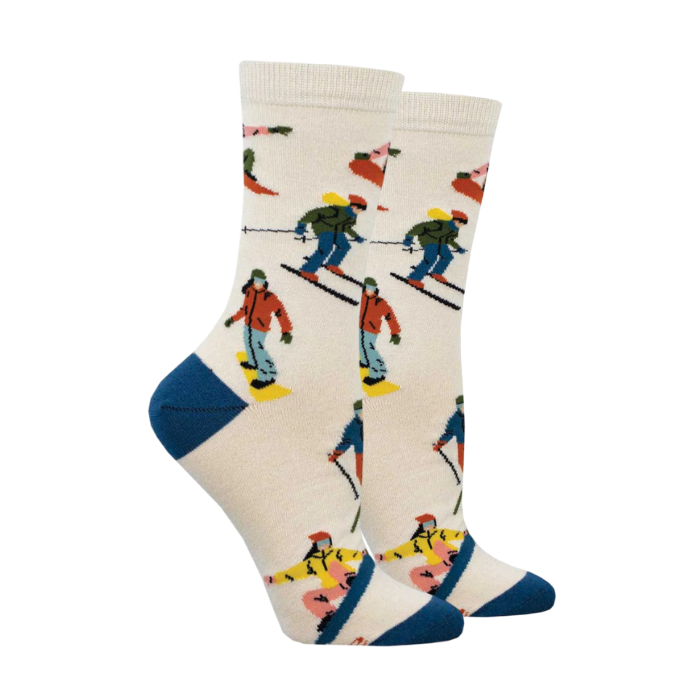 Ivory socks with skiers and snowboarders in colourful gear.