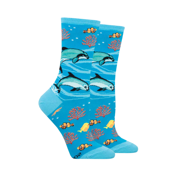 Blue socks with coral, dolphin and clown fish swimming.