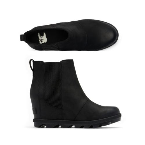 Pair of Black leather slip on wedge Chelsea boots with white Sorel logo on footbed and a lugged outsole.