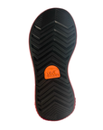 Black treaded outsole with red outline and orange Sorel logo in middle.