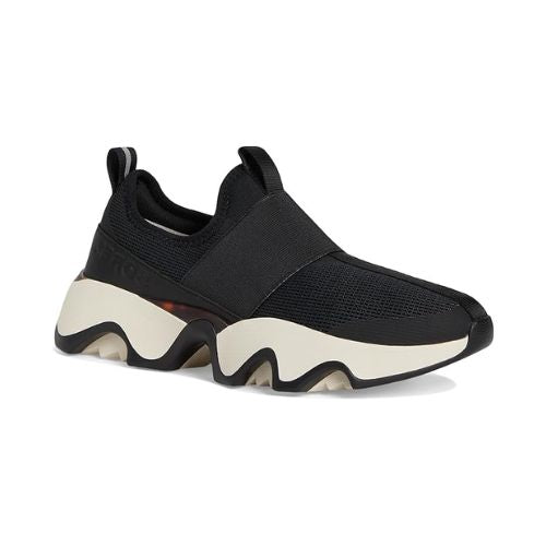 A black slip-on sneaker with a mesh upper, a pull tab on the heel, white thick midsole and a black wave pattern rubber outsole.