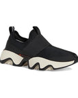 A black slip-on sneaker with a mesh upper, a pull tab on the heel, white thick midsole and a black wave pattern rubber outsole.
