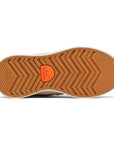 Tan zig-zag treaded outsole with orange Sorel logo in middle.