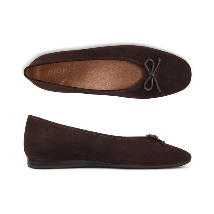 Pair of Chocolate suede ballet flats with small bow at toe and tan Vionic logo'd footbed.