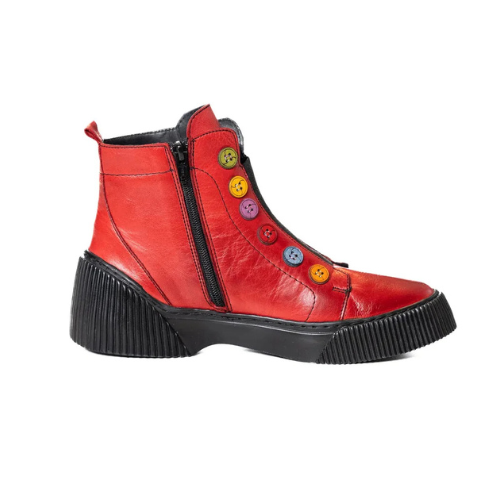 Red leather ankle boots with black platform outsole and inside zipper closure. Multi-coloured buttons run up front of boot.