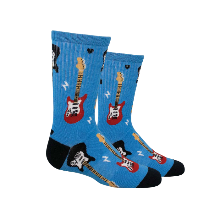 Socksmith Kids blue crew socks with red and black electric guitars and little lightening bolt icons. The toe and heel are black