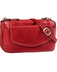 Red hand bag clutch style  featuring buckle on the strap by Derek Alexander
