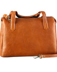 Square tan leather bag with 2 handles and an adjustable strap by Derek Alexander
