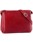 Red leather handbag with top zipper and adjustable shoulder strap.
