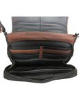 The inside of the black leather handbag has many pockets for cards, cellphone or money with brown contrasting areas for decor 