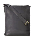 Black leather rectangular bag with a flap cover pocket and adjustable shoulder strap by Derek Alexander.