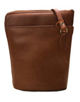 Tan bucket bag by Derek Alexander with an adjustable shoulder strap