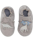 Looking down on grey leather pull on kids shoe with dinosaurs.