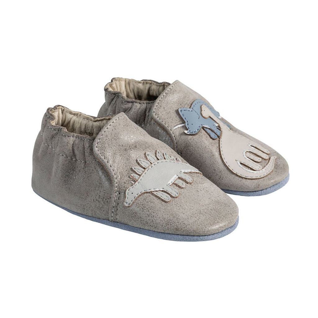 Grey leather pull on kids shoe with dinosaurs. 