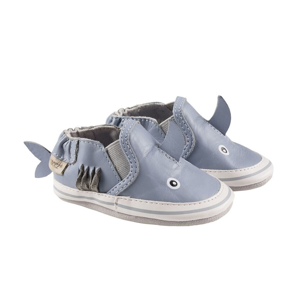 A pair of blue leather 3D shark kids shoe.