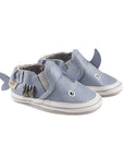 A pair of blue leather 3D shark kids shoe.
