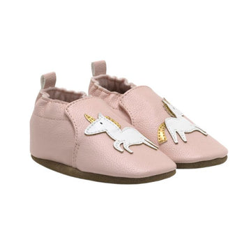 Pink leather shoes with unicorn detail on top.
