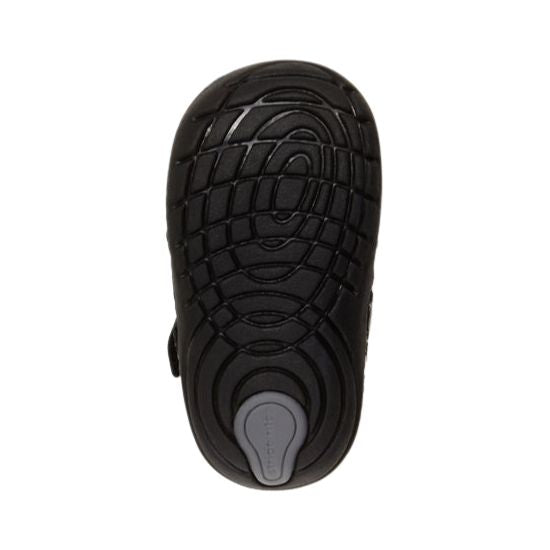 Black outsole of with Soft Motion tread pattern and Stride Rite logo stamped on heel in grey.