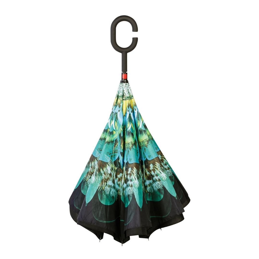 Closed Knirps reversible umbrella has c-shaped handle with peacock feathers from base to black edges