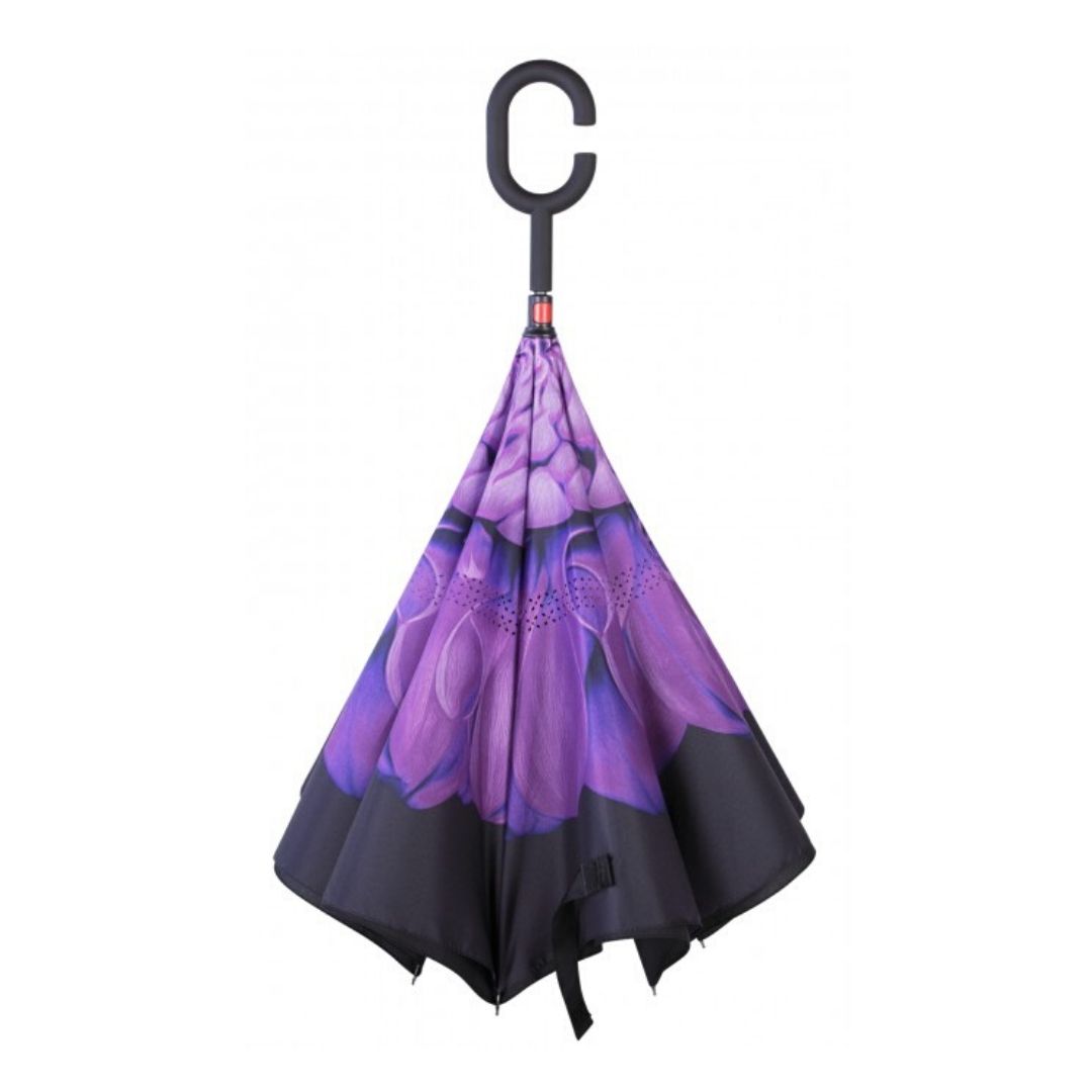 Closed Knirps reversible umbrella has c-shaped handle with purple flower from centre with black edges