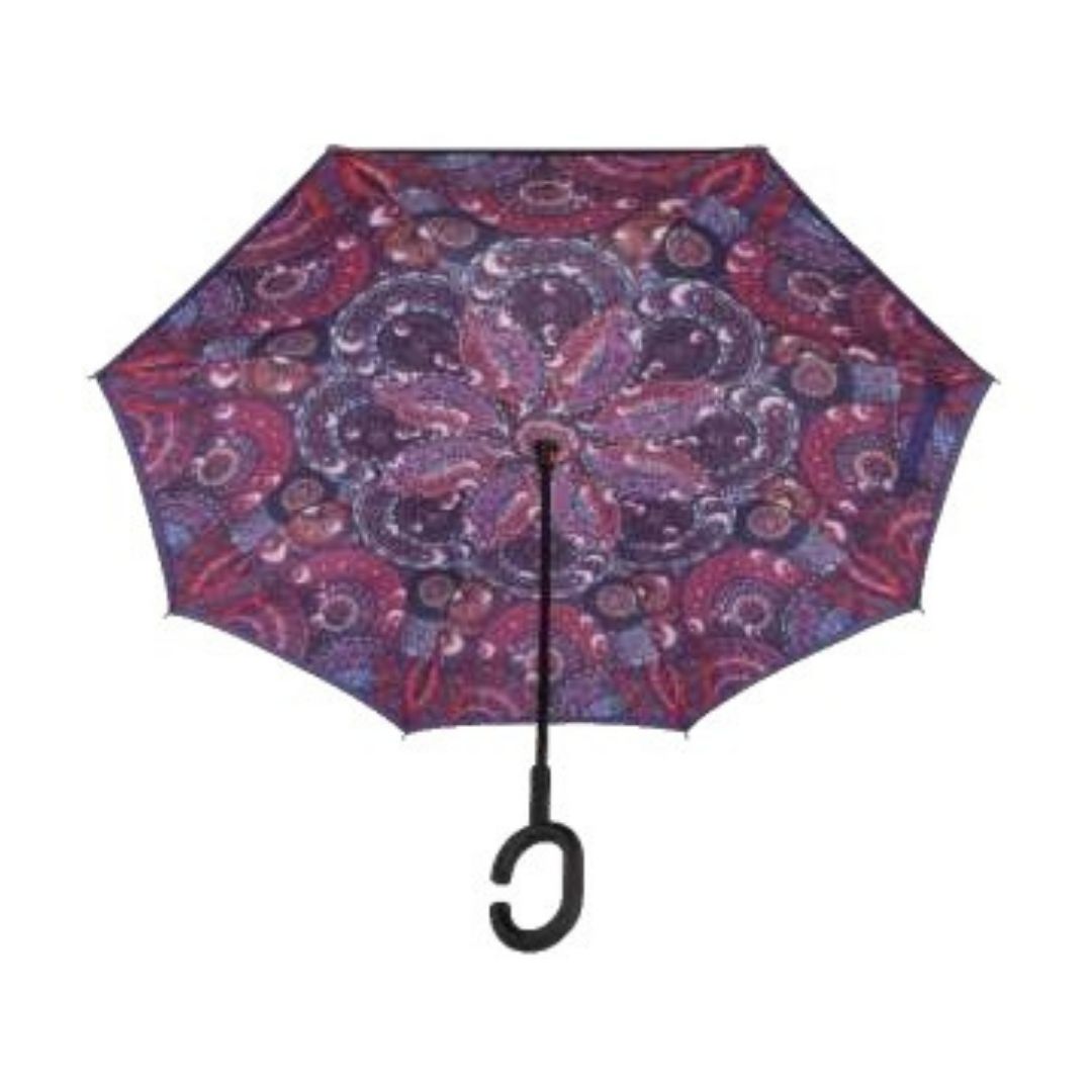 Open Knirps reversible umbrella has c-shaped handle with purple paisley design
