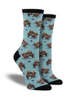 Blue socks with 2 otters floating together pattern