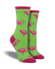 Green socks with pink accents featuring flamingos