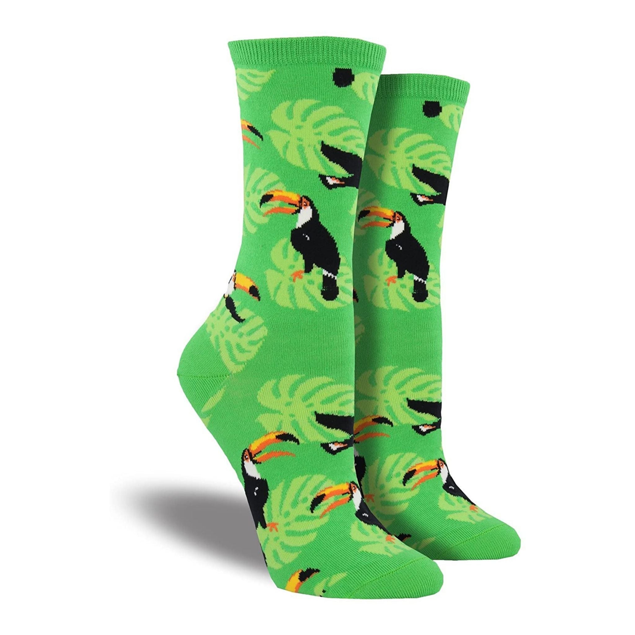 Green socks with toucans and leaves on them