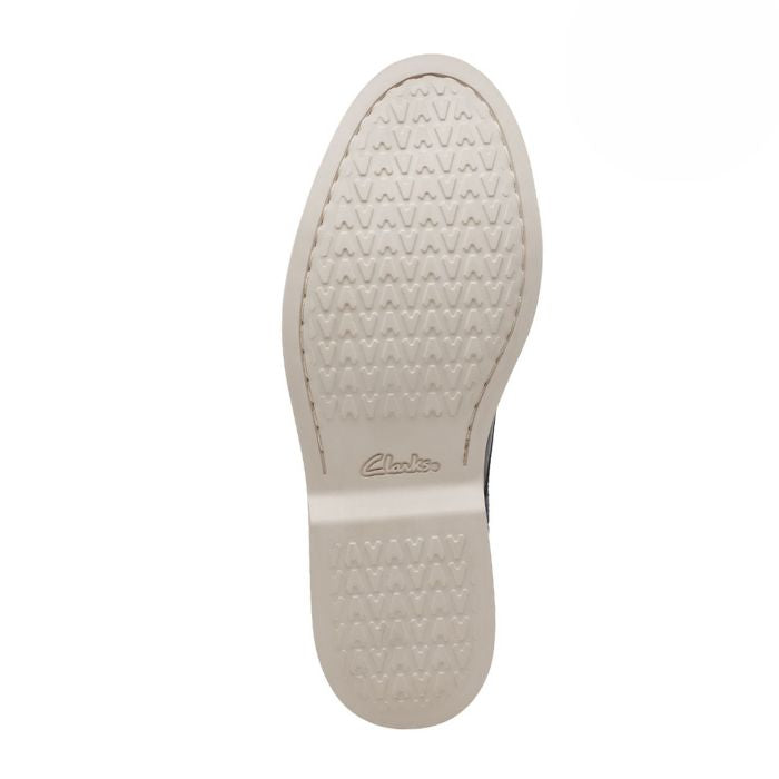 White rubber outsole with Clarks logo in center.