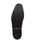 Black rubber outsole with Clarks logo printed in center.