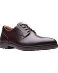 Dark brown (oxblood) Tailer oxford dress shoe by Clarks with slight heel and thick rubber outsole.