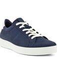 Navy nubuck sneaker with white laces and white outsole.