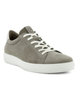Grey nubuck sneaker with white laces and white outsole.