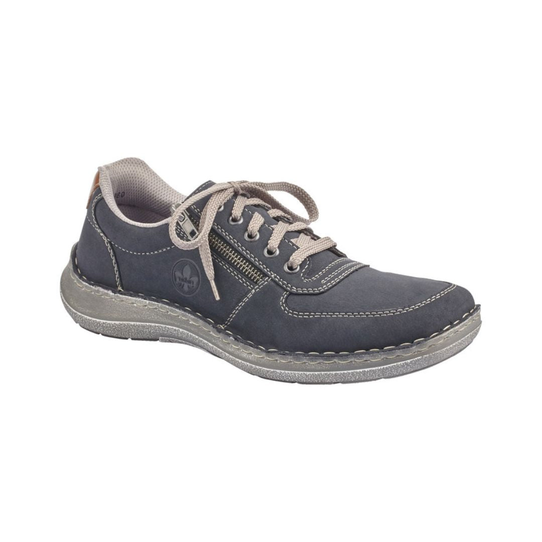 Navy sneakers with beige laces, grey outsole and side zipper.
