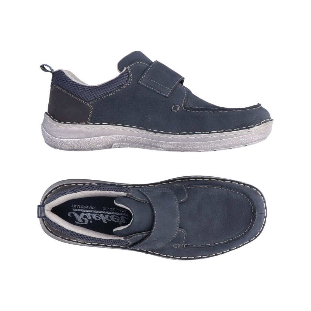 Top and side view of navy shoe with Velcro strap closure. Rieker logo is on the insole and the outsole is grey.