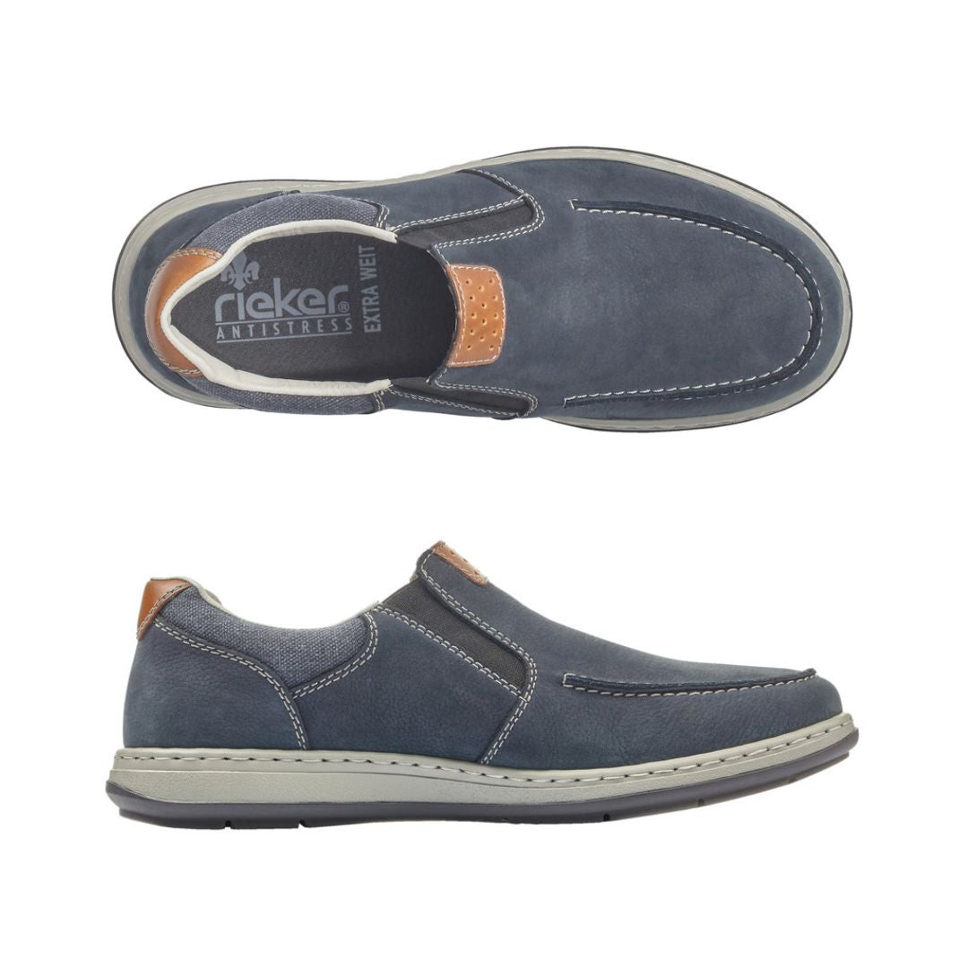 Top and side view of navy slip-on sneakers. Rieker logo on insole.