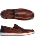 Top and side view of mens leather boat shoe. Rieker logo on insole.