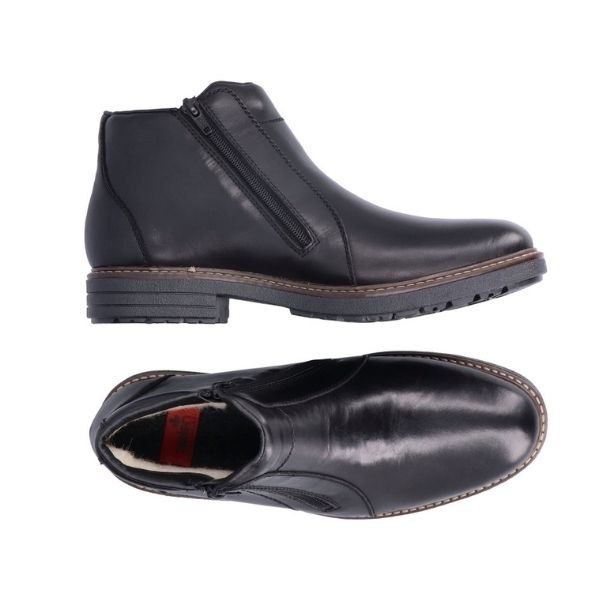 Top and side view of leather ankle winter boot. White wool lining with red Rieker logo on heel.