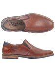 Top and side view of brown Rieker slip-on dress shoe.