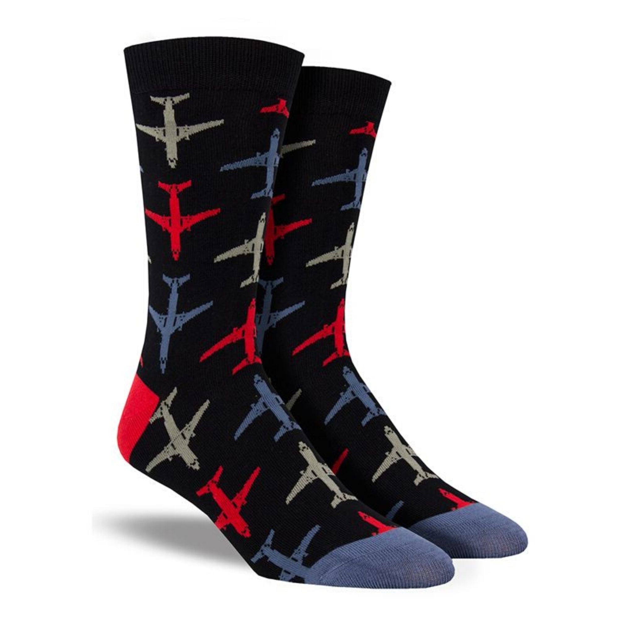 A pair of black socks with blue, red and grey airplanes on them. Made by Socksmith.