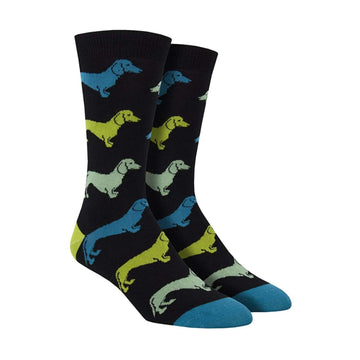 Black socks with green and blue Dachshund dogs
