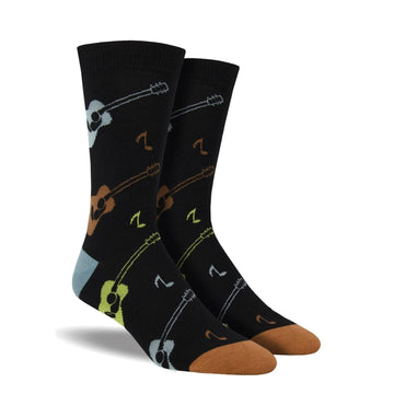 Black socks with colourful acoustic guitars on them (blue heel and brown toe)