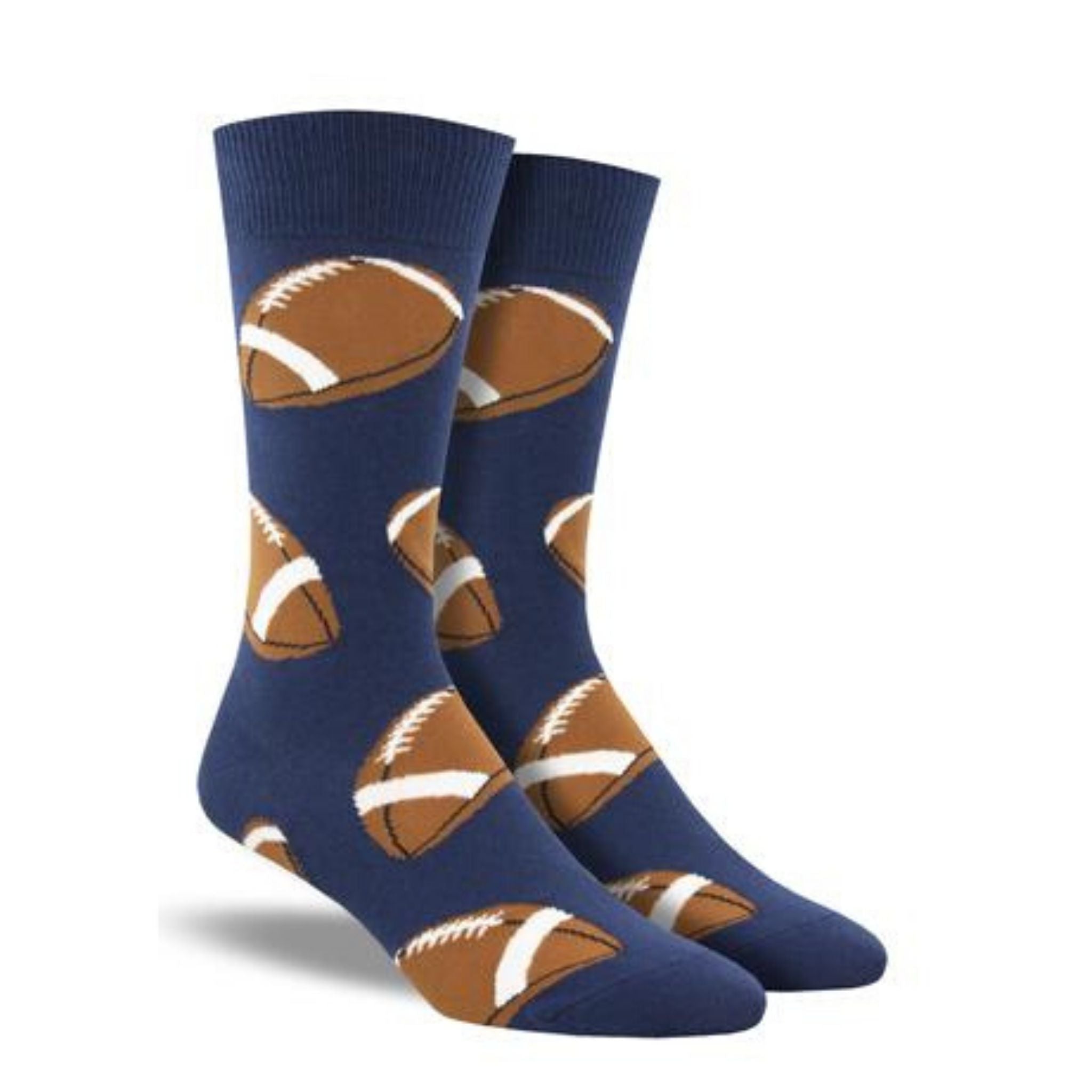 A pair of men's blue crew socks with footballs on them.